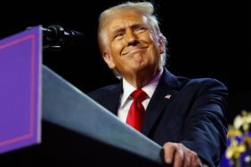 Republican presidential nominee, former U.S. President Donald Trump arrives to speak during an election night event at the Palm Beach Convention Center on November 06, 2024 in West Palm Beach, Florida. Americans cast their ballots today in the presidential race between Republican nominee former President Donald Trump and Vice President Kamala Harris, as well as multiple state elections that will determine the balance of power in Congress.