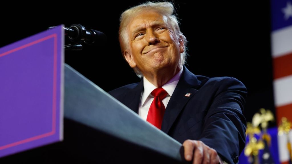 Republican presidential nominee, former U.S. President Donald Trump arrives to speak during an election night event at the Palm Beach Convention Center on November 06, 2024 in West Palm Beach, Florida. Americans cast their ballots today in the presidential race between Republican nominee former President Donald Trump and Vice President Kamala Harris, as well as multiple state elections that will determine the balance of power in Congress.