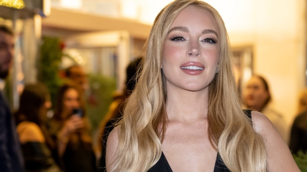 Lindsay Lohan Goes Bold in a Plunging Sheer Black Dress