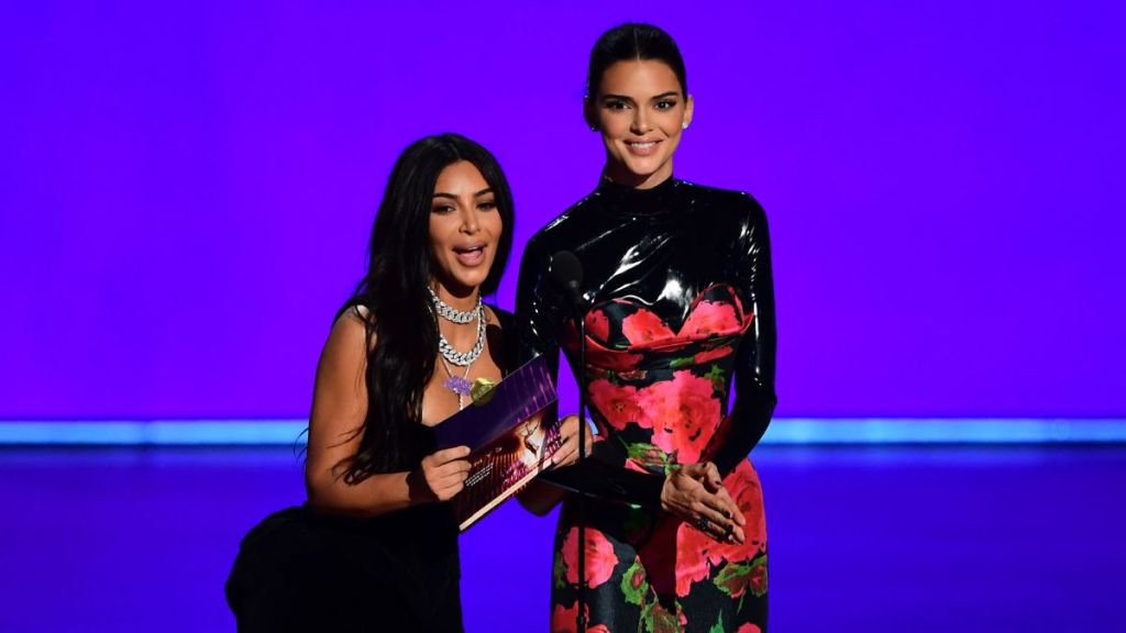 US television personalities Kim Kardashian (L) and Kendall Jenner present the award for Outstanding Competition Program onstage during the 71st Emmy Awards at the Microsoft Theatre in Los Angeles on September 22, 2019.