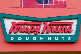 The logo of "Krispy Kreme Doughnuts" can be seen at a branch of the chain