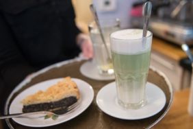 An employee prepares vegan matcha latte and cake at vegan cafe No Milk Today on January 27, 2018 in Berlin, Germany. No Milk Today offers among other self made vegan cakes and pies, smoothies, and breakfast. Since vegan and vegetarian food is a growing trend, more and more stores are specializing in pure herbal products as an alternative to conventional food.