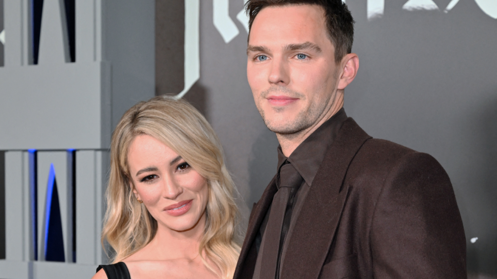 US model Bryana Holly (L) and British actor Nicholas Hoult attend the Los Angeles premiere of "Nosferatu" at the TCL Chinese theatre in Hollywood, California, December 12, 2024.