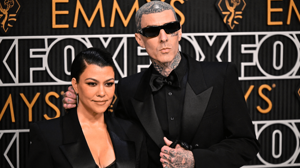 US socialite Kourtney Kardashian and husband US musician Travis Barker arrive for the 75th Emmy Awards at the Peacock Theatre at L.A. Live in Los Angeles on January 15, 2024.