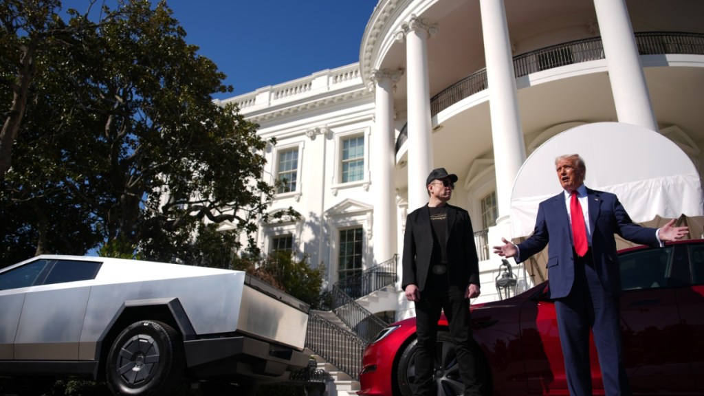 Donald Trump & Elon Musk Pose With Tesla at White House Amid Boycott